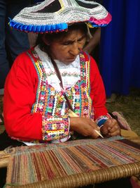 Peruvian woman weaving